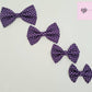Purple polka dot bow tie