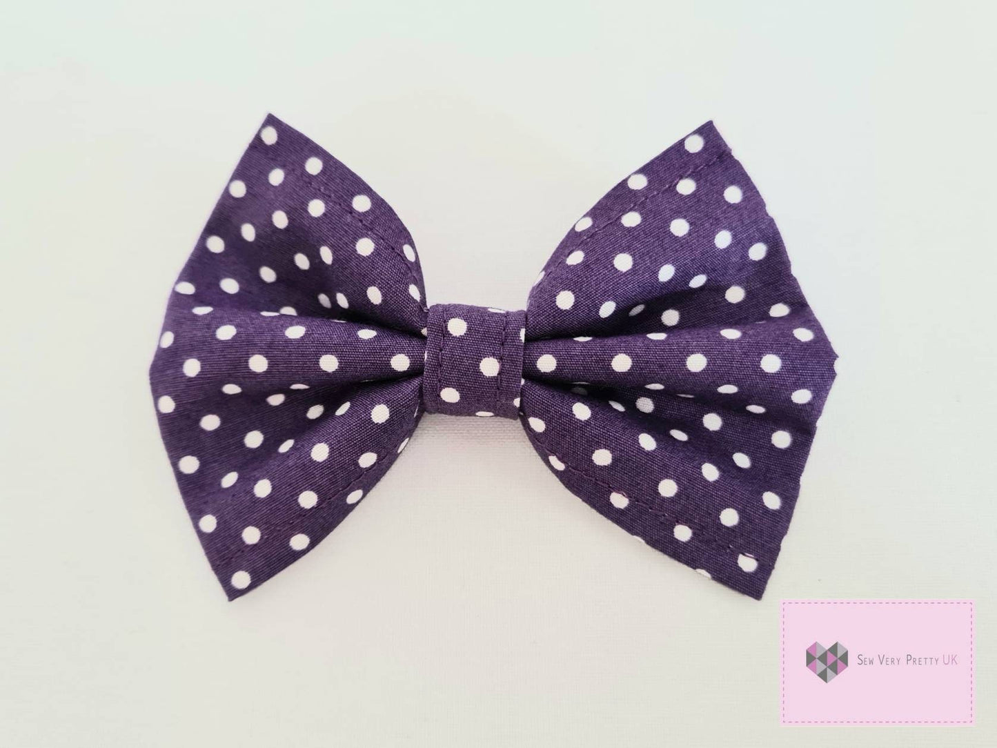 Purple polka dot bow tie